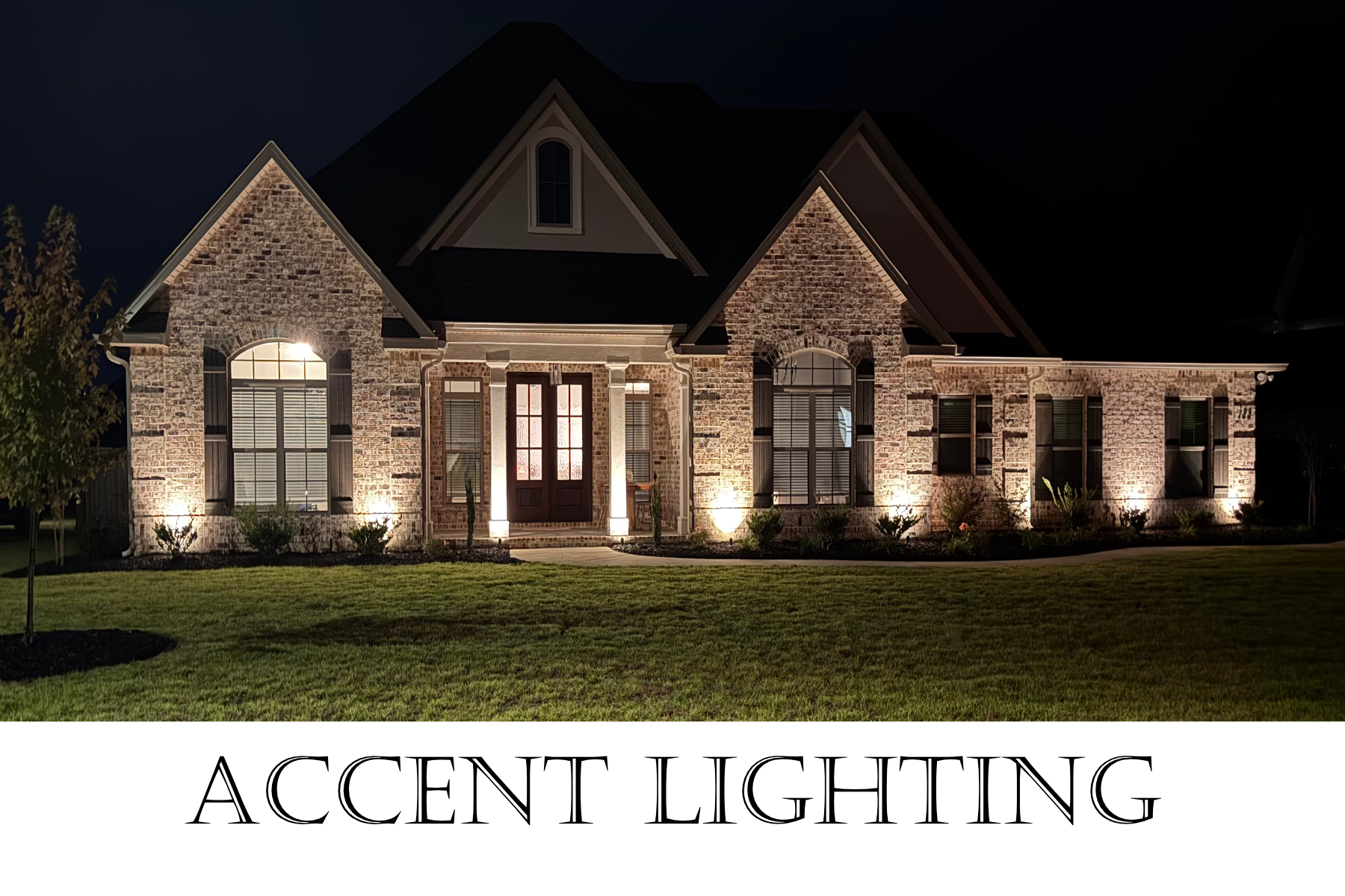 Accent lighting example on a brick home exterior